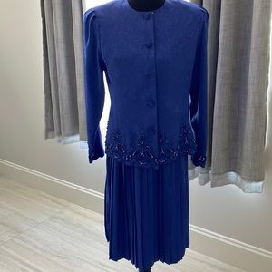 Womens gently used two piece blue.. Skirt and jacket in great shape.